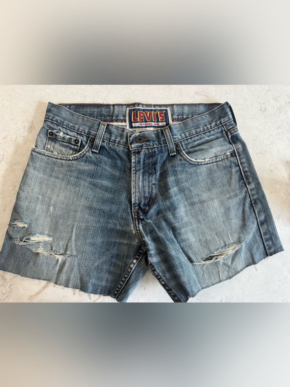 Vintage Levi's Light Wash Distressed Cutoff Denim Shorts size 30